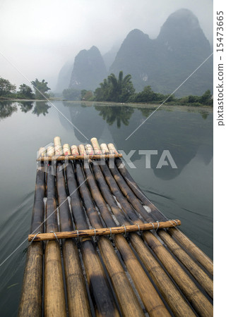 China Guilin Yangshuo bamboo rafting in the beautiful "Yulong River" 15473665