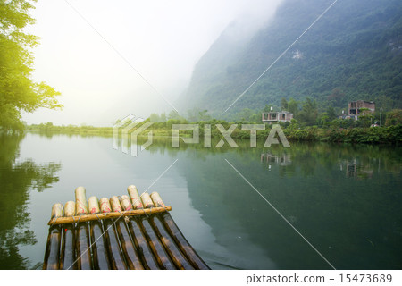China Guilin Yangshuo bamboo rafting in the beautiful "Yulong River" 15473689