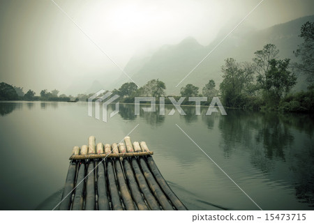 China Guilin Yangshuo bamboo rafting in the beautiful "Yulong River" China Guilin Yangshuo bamboo rafting in the beautiful "Yulong River" 15473715