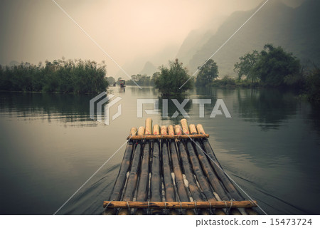 China Guilin Yangshuo bamboo rafting in the beautiful "Yulong River" 15473724