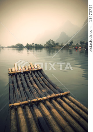 China Guilin Yangshuo bamboo rafting in the beautiful "Yulong River" 15473735