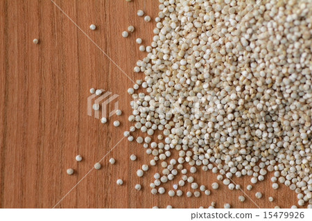 Peruvian quinoa superfood on a wooden plate Peruvian quinoa superfood on a wooden plate 15479926