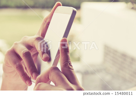 Woman Using a Smart Phone 15480011