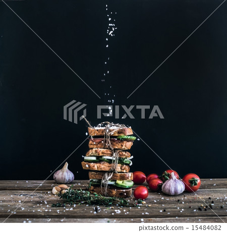 Sandwiches with smoked meat, tomato, garlic Sandwiches with smoked meat, tomato, garlic 15484082