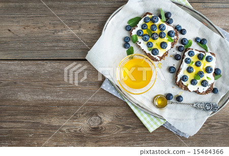 Healthy breakfast set with ricotta, blueberries 15484366