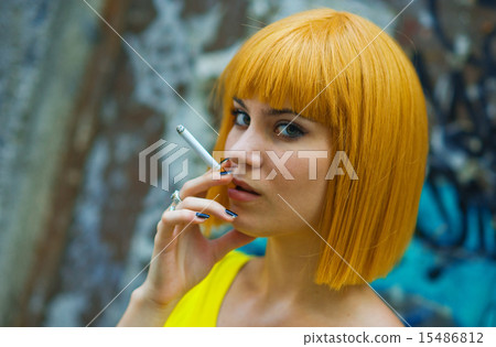 woman smoking cigarette 15486812