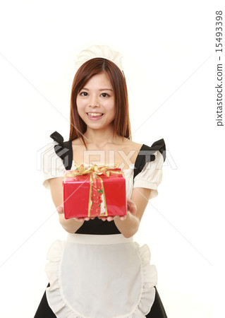 Maid presenting present 15493398