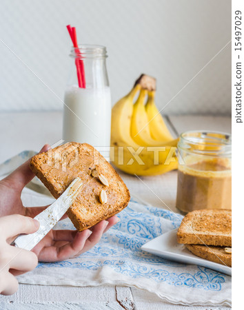 banana smoothie, toast with peanut butter 15497029