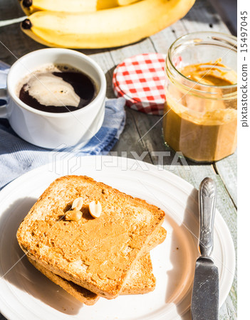 crispy toast with peanut butter, bananas, coffee crispy toast with peanut butter, bananas, coffee 15497045