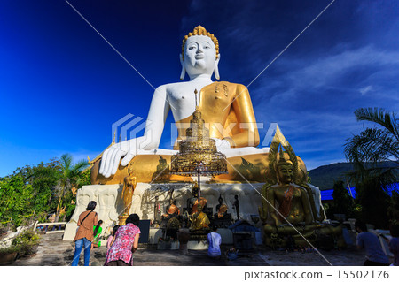 Buddha Statue with prayers. Wat Phra That Doi Kham 15502176