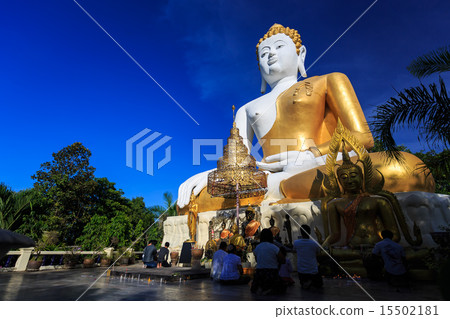 Buddha Statue with prayers. Wat Phra That Doi Kham 15502181