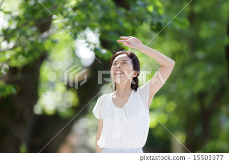 Fresh green middle-aged female 15503977