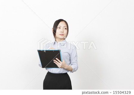 A young lady with a binder 15504329