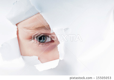 Cute baby girl looking through paper hole Cute baby girl looking through paper hole 15505053