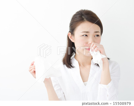 A young woman with tissue paper 15508979