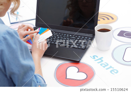Woman working with a laptop Woman working with a laptop 15510624