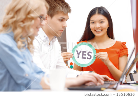 Young team working on new apps Young team working on new apps 15510636