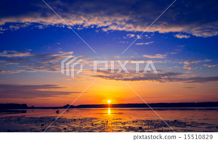 Amazing sunset over lake Amazing sunset over lake 15510829