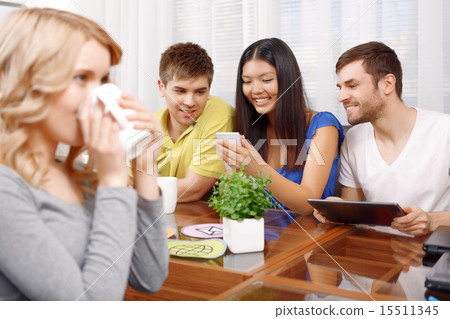 Blond girl and her team of developers 15511345