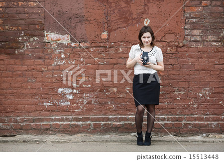 Woman with camera 15513448