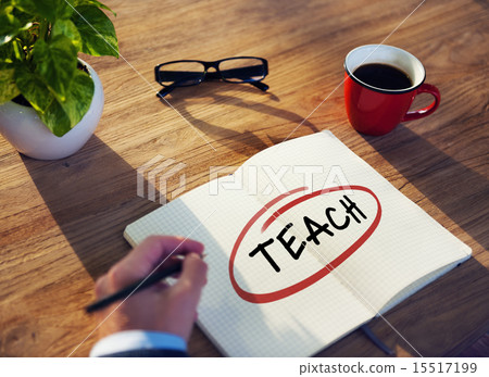 Businessman Writing the Word "Teach" Businessman Writing the Word "Teach" 15517199