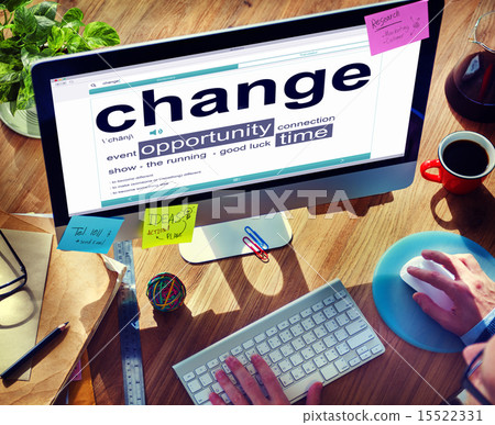 Man Reading the Definition of Change 15522331