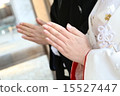 Wedding ceremony, bride and groom's hand holding hands in white parenthood hand 15527447