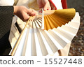 Wedding ceremony, bride and groom superimposing folding fans with white fancy figure 15527448