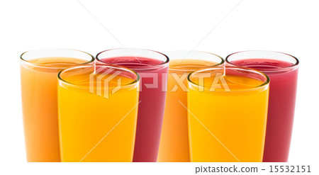 Tropical juices in glasses close up Tropical juices in glasses close up 15532151