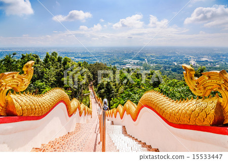 Golden Naka statue on staircase balustrade  15533447