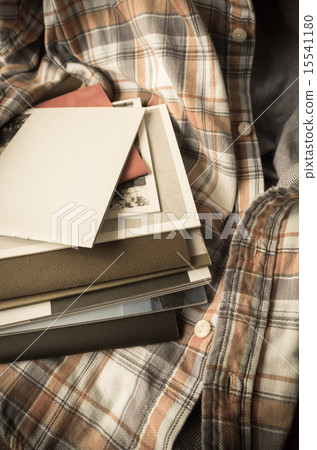 Book placed on clothes Book placed on clothes 15541180