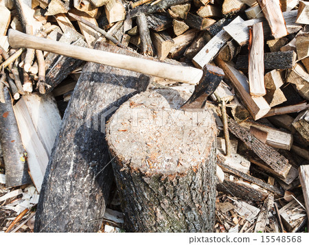 wood chopper ax in block for chopping firewood 15548568