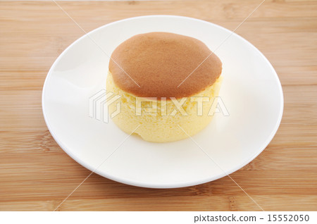 Sponge cake hot cake table on a dish Sponge cake hot cake table on a dish 15552050