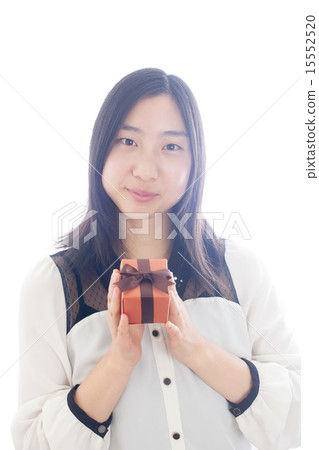 A young lady with a present A young lady with a present 15552520