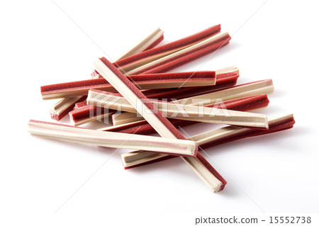 Yummy meat flavor dog treat sticks on background Yummy meat flavor dog treat sticks on background 15552738