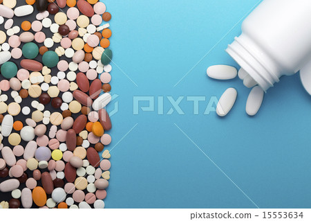 Different pills and bottle with copy space Different pills and bottle with copy space 15553634