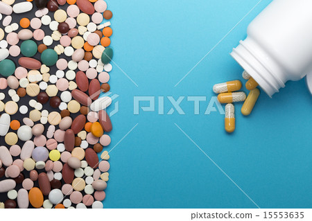 Different pills and bottle with copy space Different pills and bottle with copy space 15553635