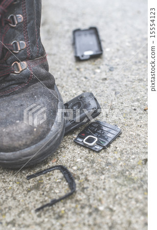 Old broken mobile phone 15554123