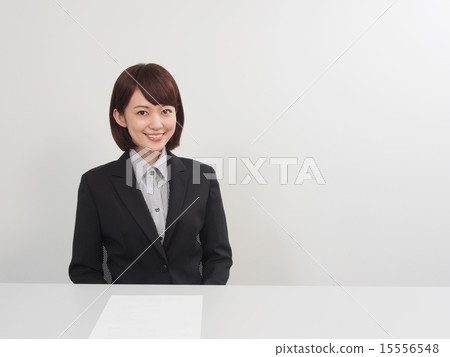A woman receiving an interview 15556548