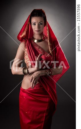 Sensual East woman dressed in sari. Mehndi art 15557896