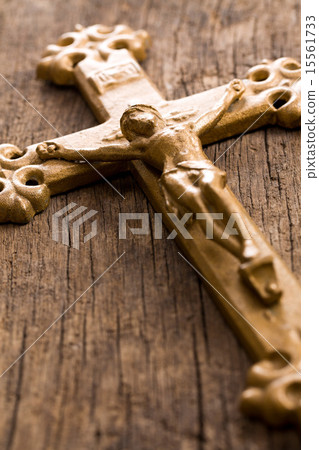 crucifix on wooden background 15561733