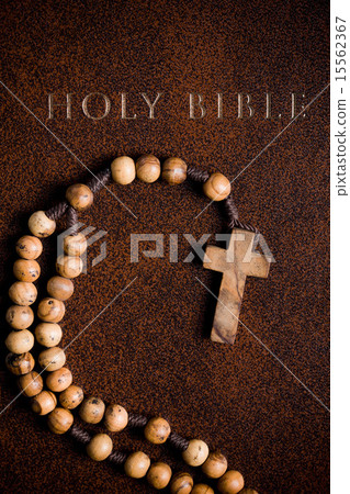 wooden rosary on the Bible wooden rosary on the Bible 15562367