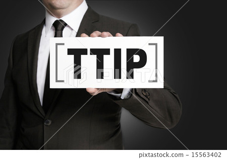 TTIP sign is held by businessman. 15563402