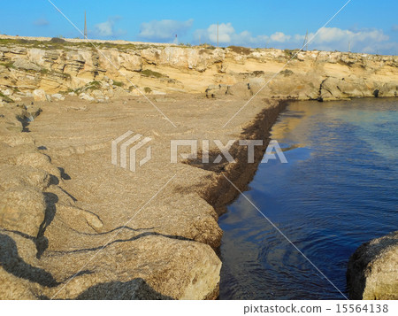 A view of a rocky shore of a Sicily island A view of a rocky shore of a Sicily island 15564138