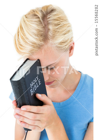 Pretty blonde woman holding bible Pretty blonde woman holding bible 15568282