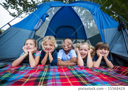 Happy siblings on a camping trip Happy siblings on a camping trip 15568429