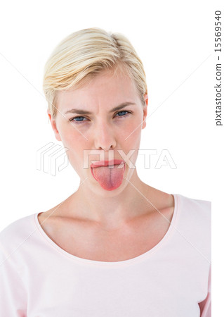Blonde woman sticking her tongue out 15569540