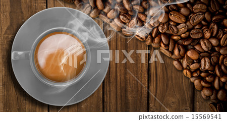 Composite image of yellow cup of coffee 15569541