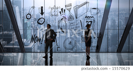 Composite image of businessman standing 15570629