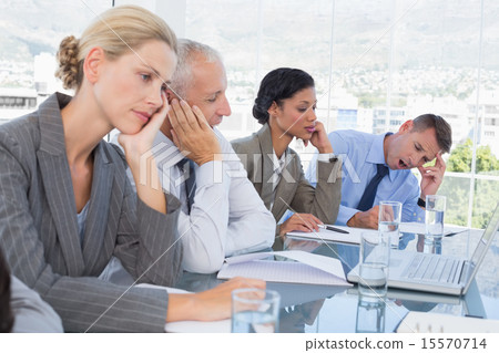 Tired business team at conference Tired business team at conference 15570714